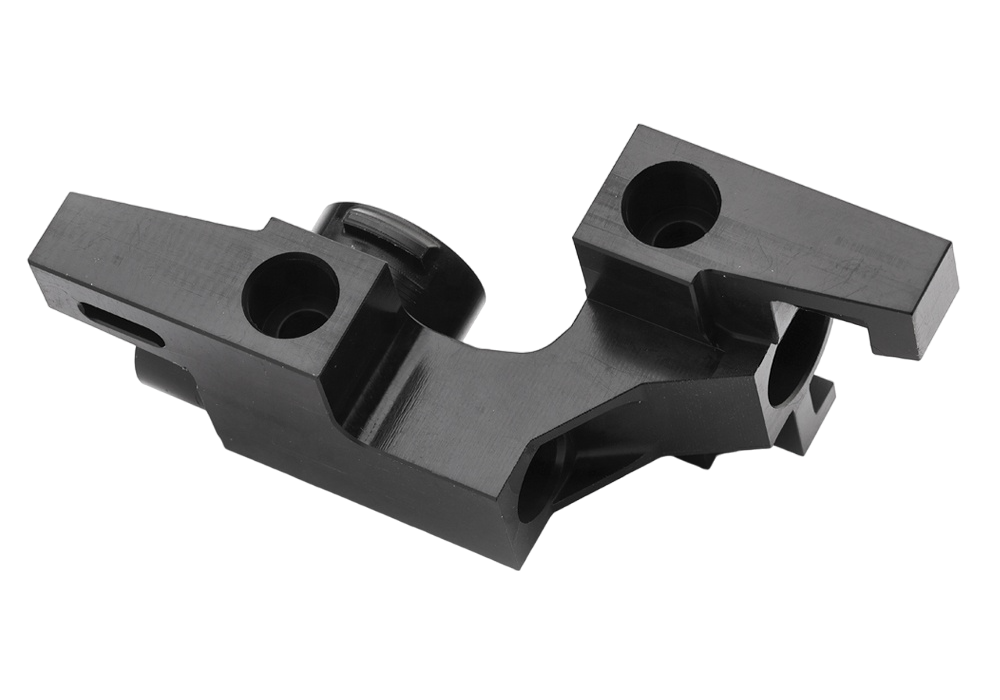CNC-machined compact black plastic parts