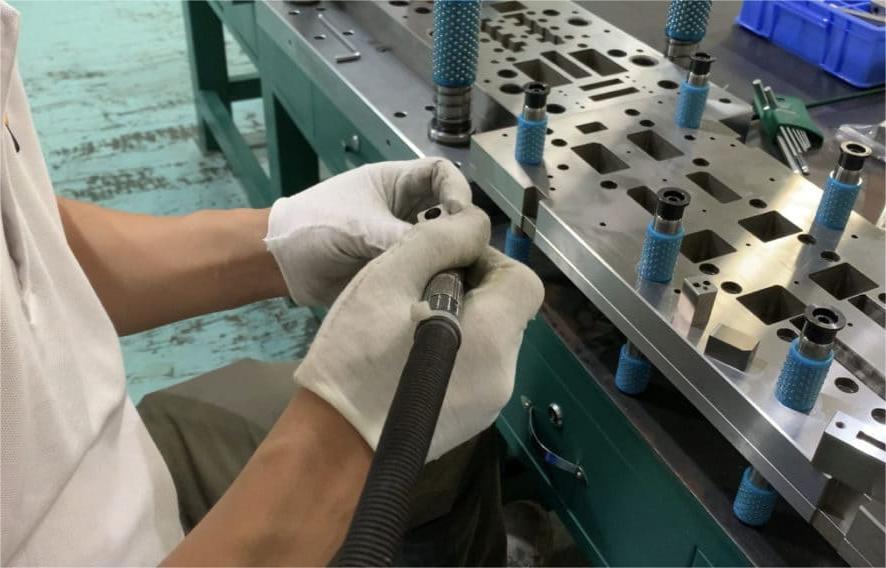 Assembly of precision stamped parts molds