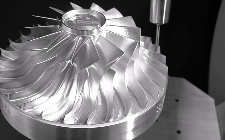 The impeller that is currently being machined by five-axis processing