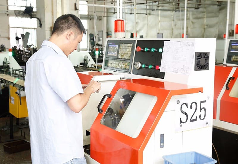 The workers who are placing the production materials for the pogo pins 4