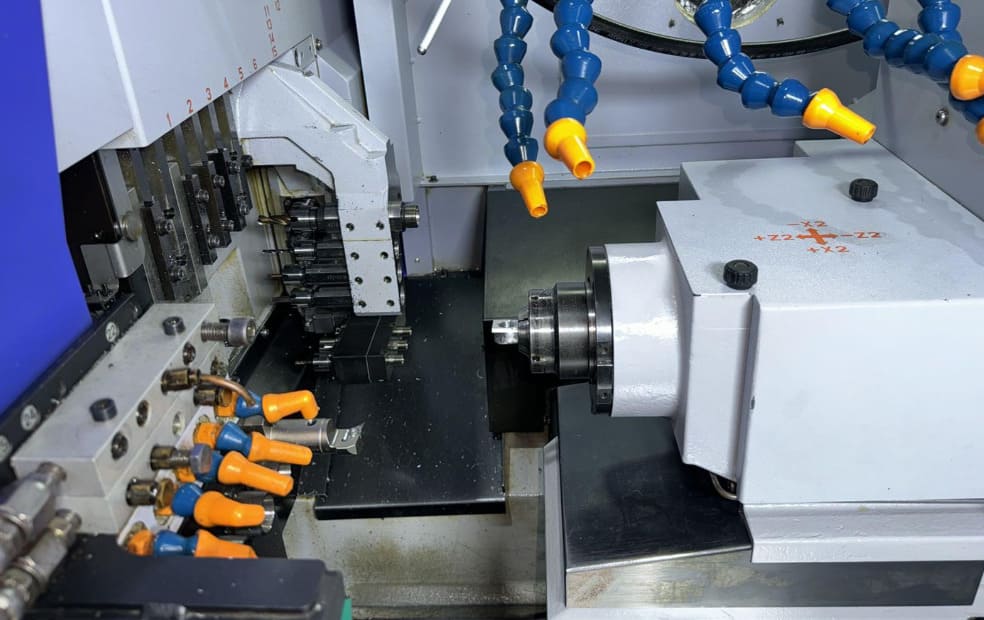 How Swiss Lathes Use Sliding Headstocks and Guide Bushings